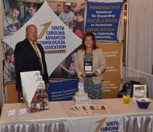 Rick Roberts  SCATE Assistant Director and Emery DeWitt  SCATE Program Manger smile for photo at the 2017 HI TEC conference